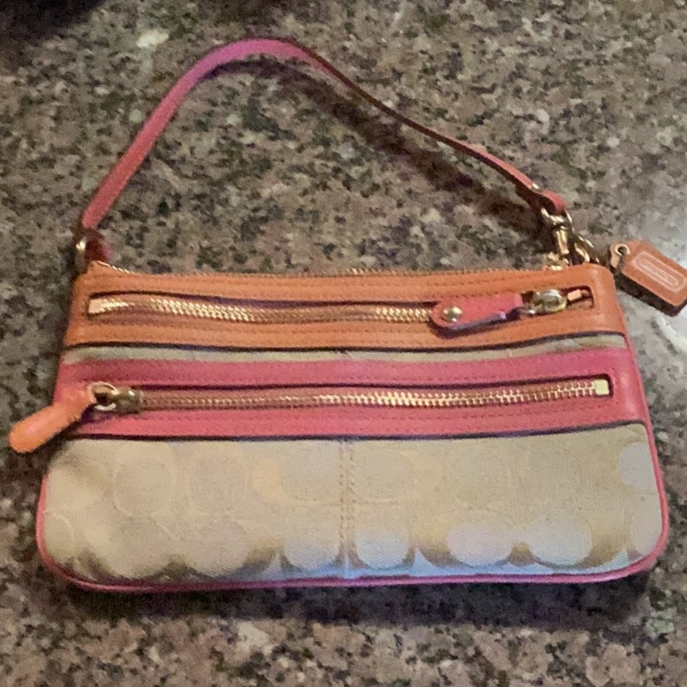 Coach tan/brown/orange-peach wristlet